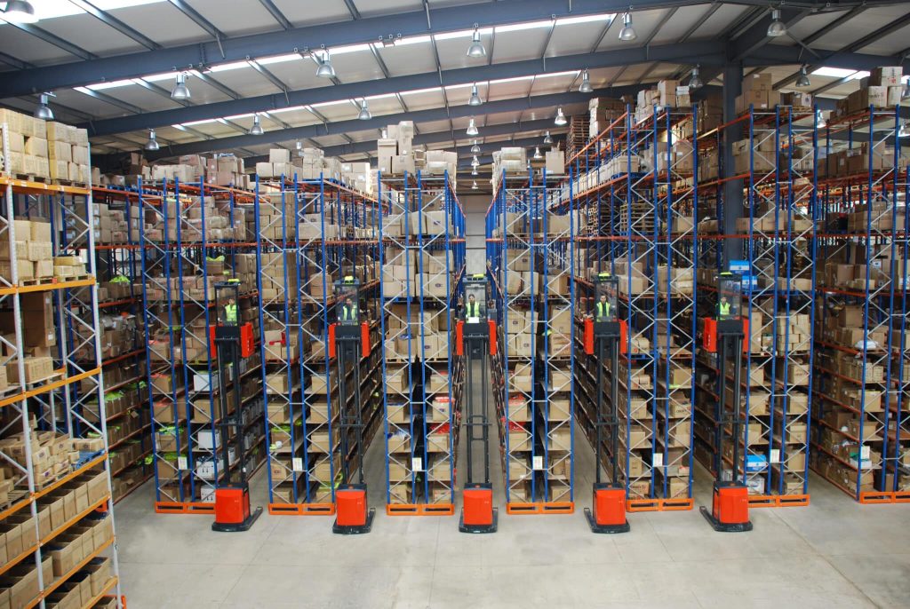 warehouse-pallet-racking-system-suppliers-uk Warehouse pallet racking systems installed in an e-commerce facility by suppliers Teepee Materials Handling