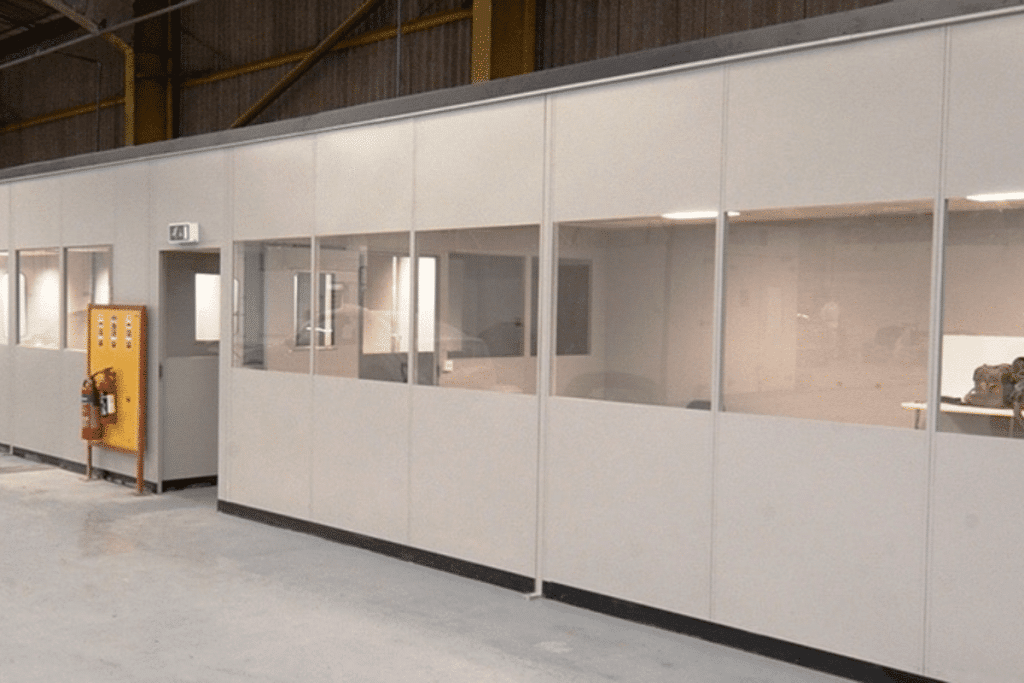 industrial-partitioning-wall-systems Industrial partitioning walls installed in a warehouse by Teepee Materials Handling