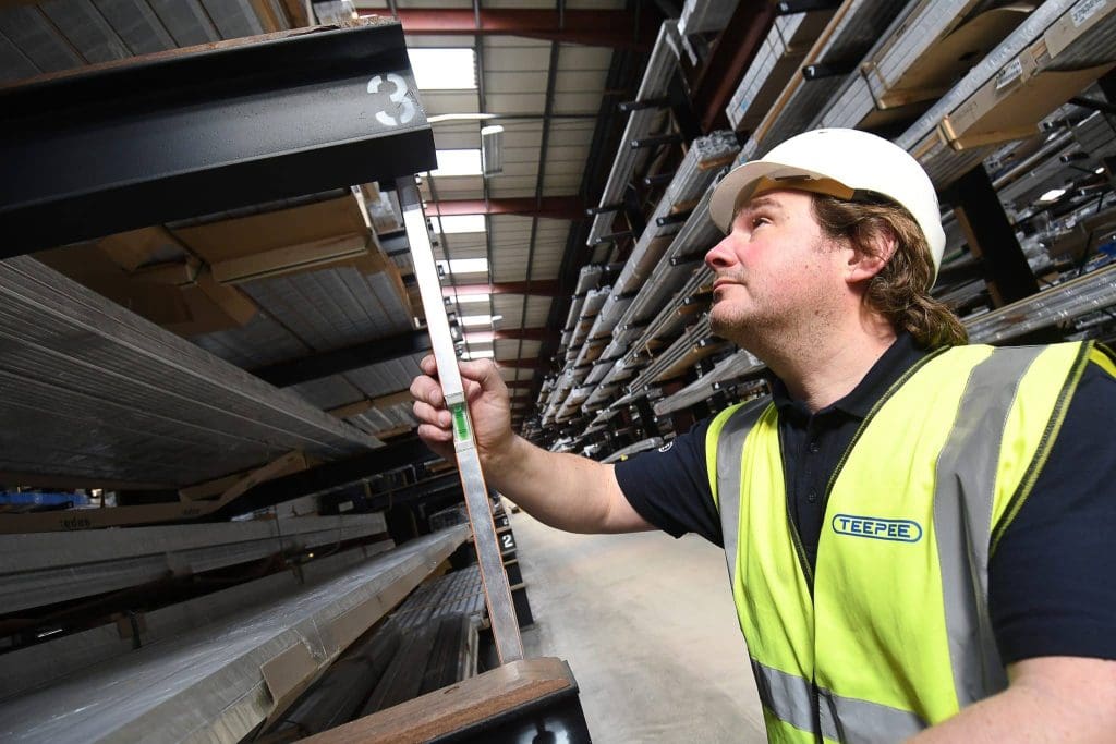 A cantilever racking inspection being performed by a Teepee Materials Handling SEMA-Approved Rack Inspector (SARI)